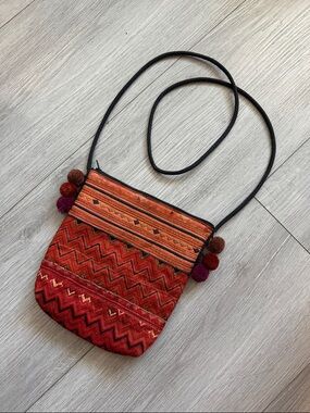 Boho Red Woven Crossbody Bag with Pom Pom Accents - Perfect Festival Essentials